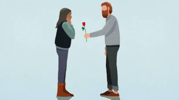 Man giving rose to surprised girlfriend