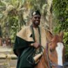 Adekunle Gold Proves He’s the King of Style in Green Velvet Agbada